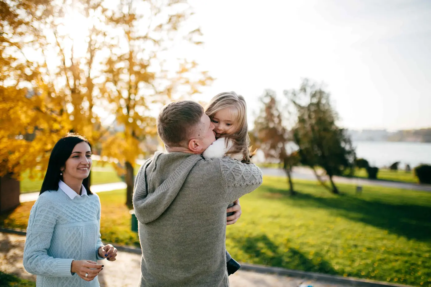 A family together in a warm, comfortable setting